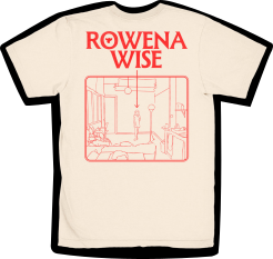 Rowena Wise T-Shirt. The T-Shirt is a cream colour with a red monochrome, screen-printed image of Ro standing in the middle of a small furnished room. The image on the Tee is saturated in the center by a single light in the middle of the room.